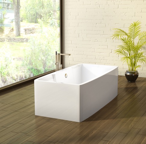 A white bathtub sitting on top of a wooden floor.